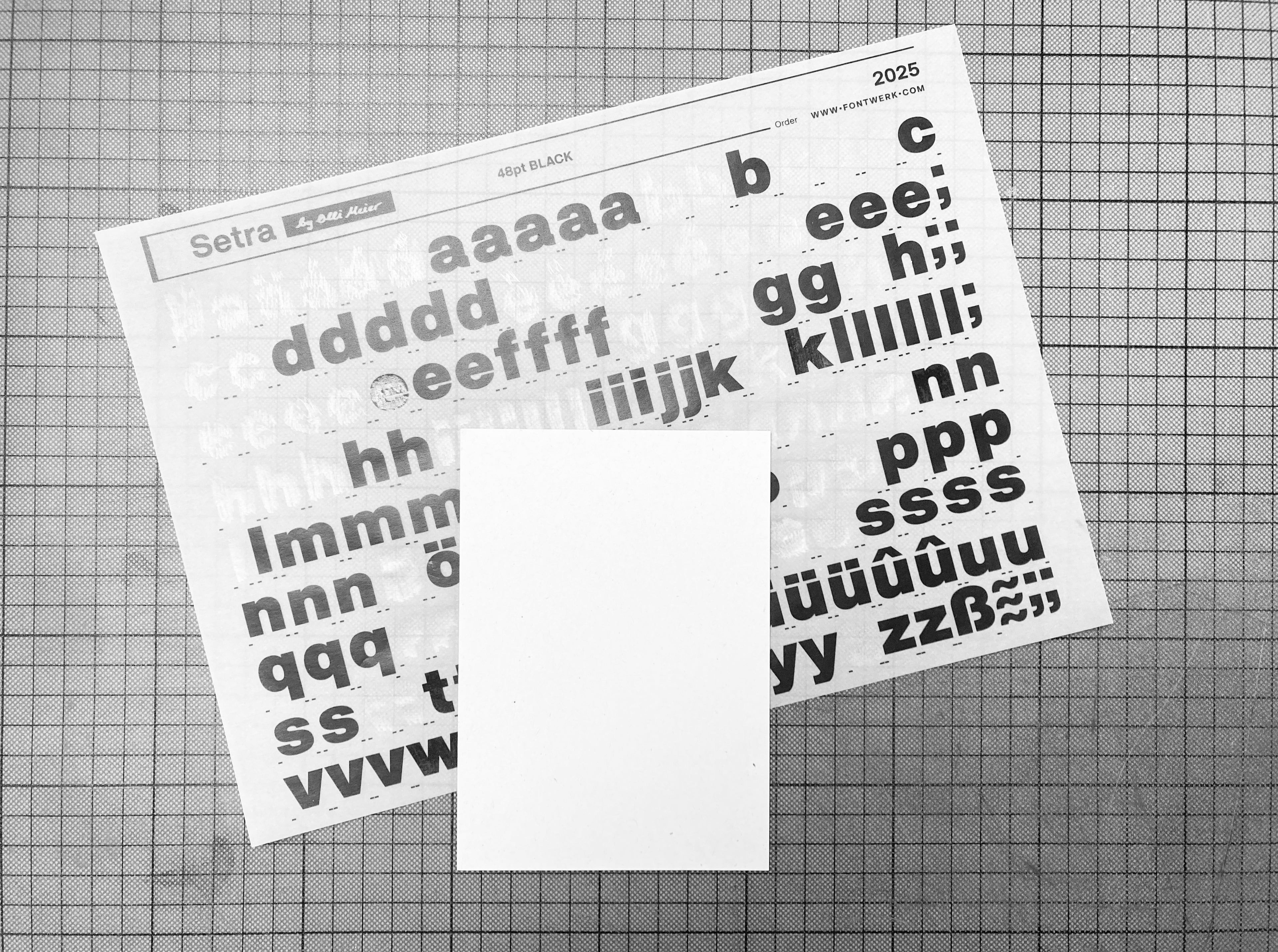 Unique Postcard Setra 48pt Black Lowercase